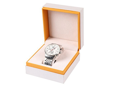 white and orange luxury watch flap box