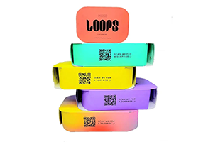 A colorful stack of packaging boxes for Loops eye masksx300