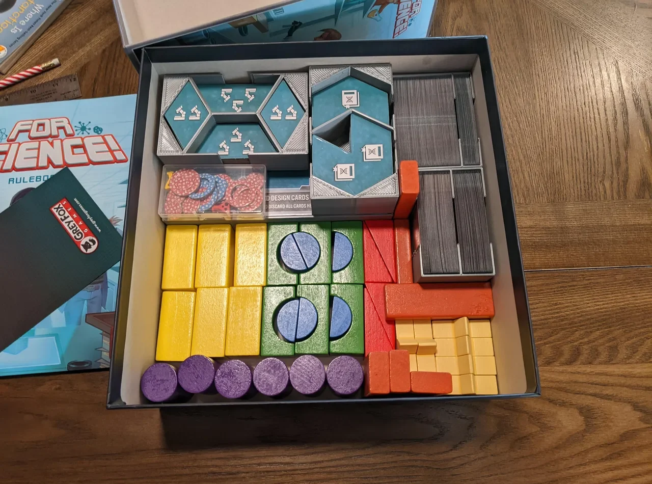 board game box internal layout with protective inserts