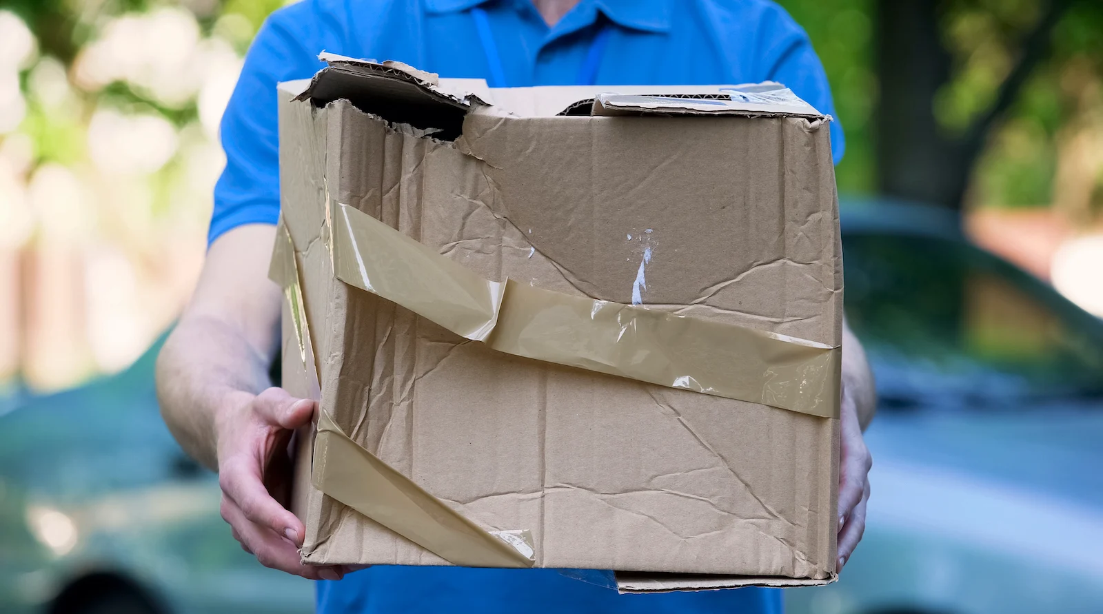 damaged shipping box broken outer packaging logistics