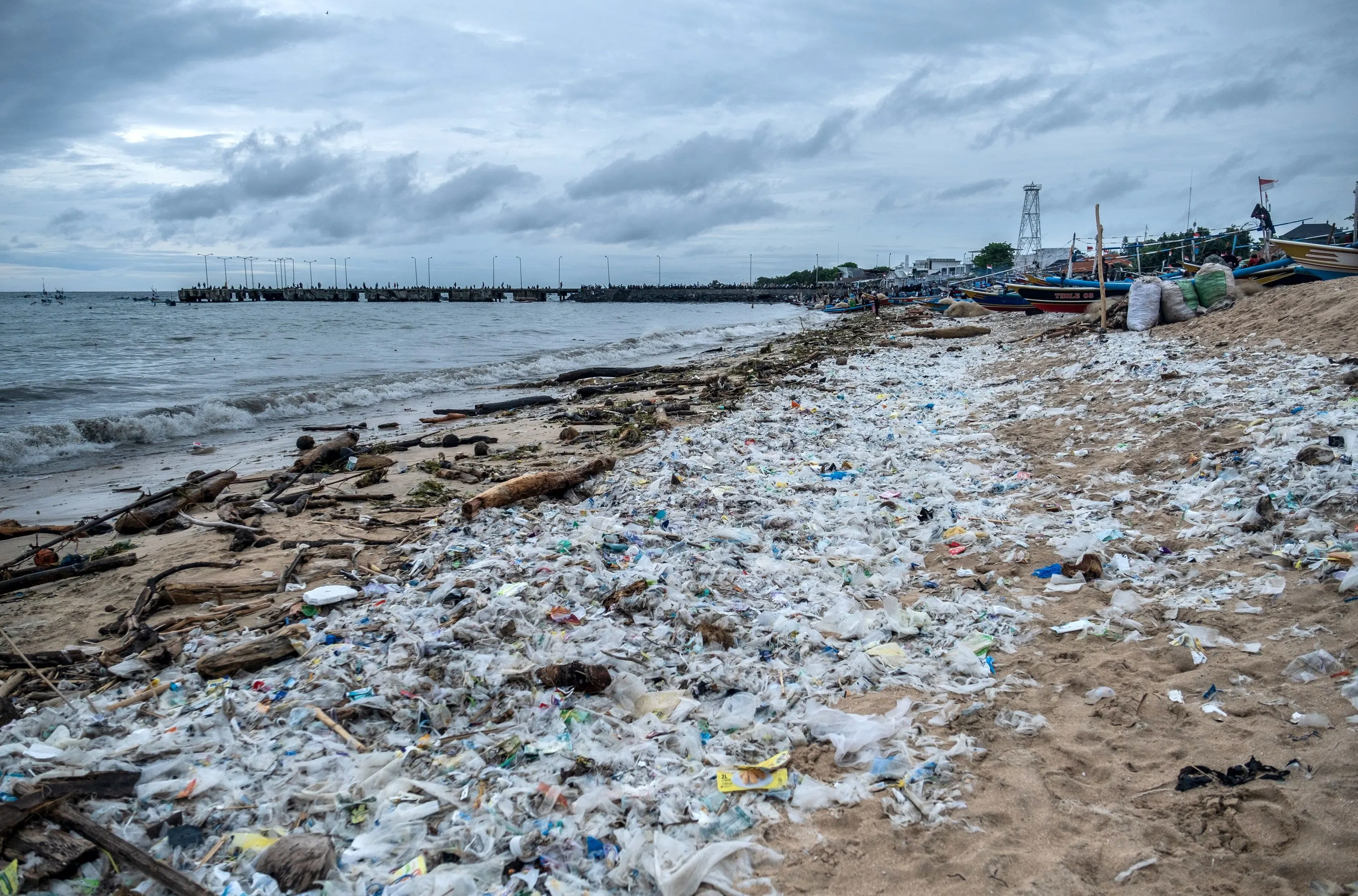 mountain of single use plastic waste polluting landfill and ocean