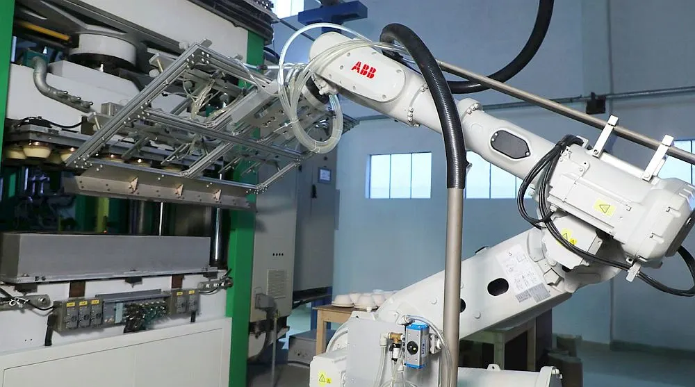 automated packaging factory with renewable energy and waste reduction