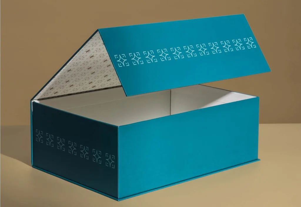 greyboard and grey card side by side, packaging comparison, luxury box material, sturdy board, thin craft card