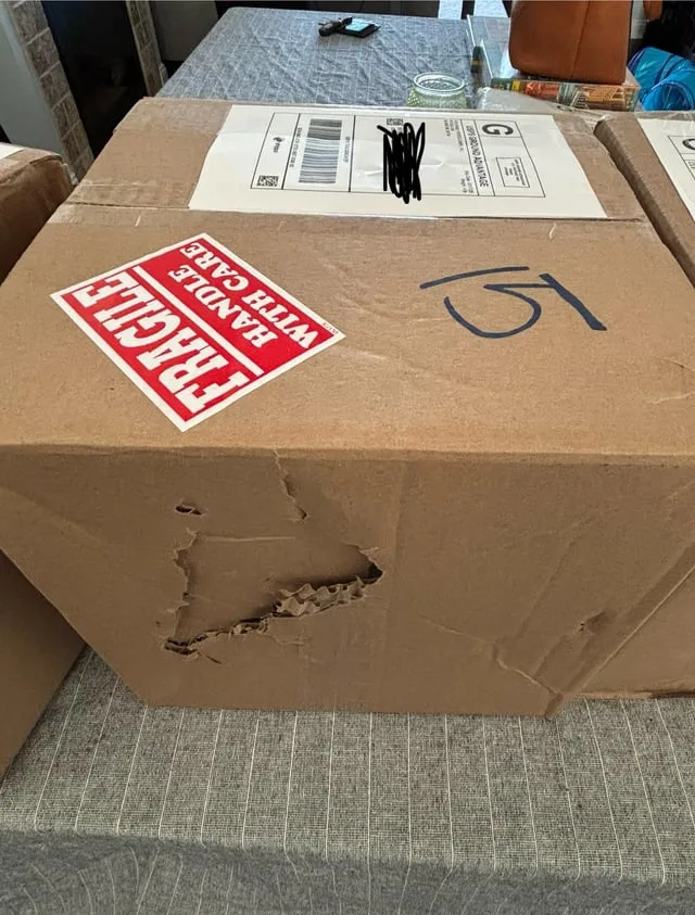 damaged luxury wine packaging shipment online ecommerce problem