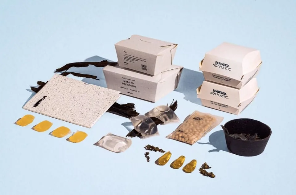 eco-friendly packaging materials in modern factory setting