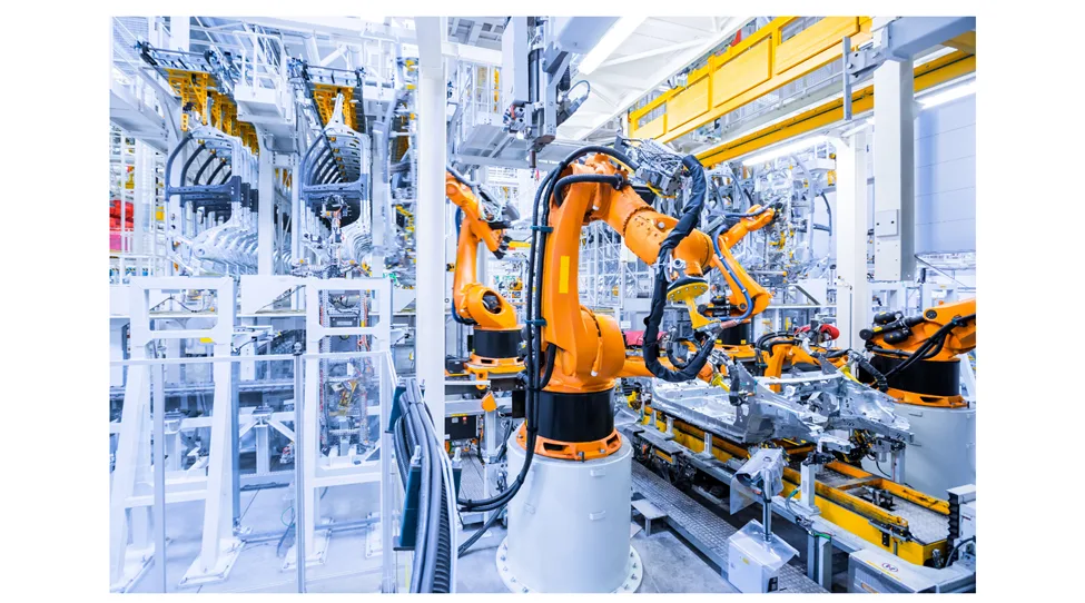 human and robot collaborating in smart packaging factory