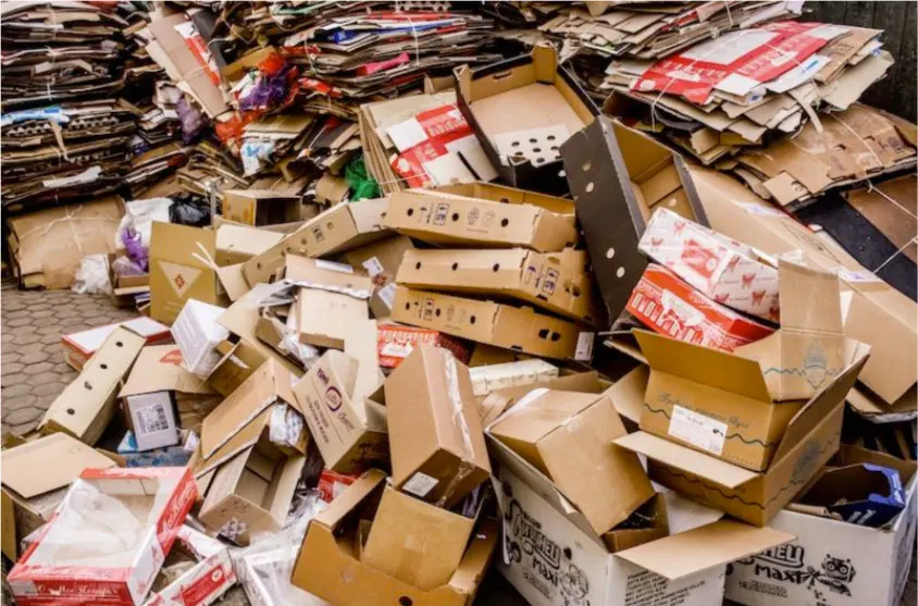 pile of discarded packaging waste pollution environmental problem